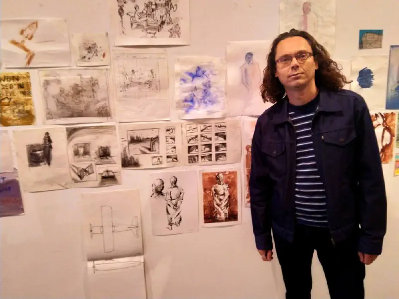 Me in front of my wall with works at the expo